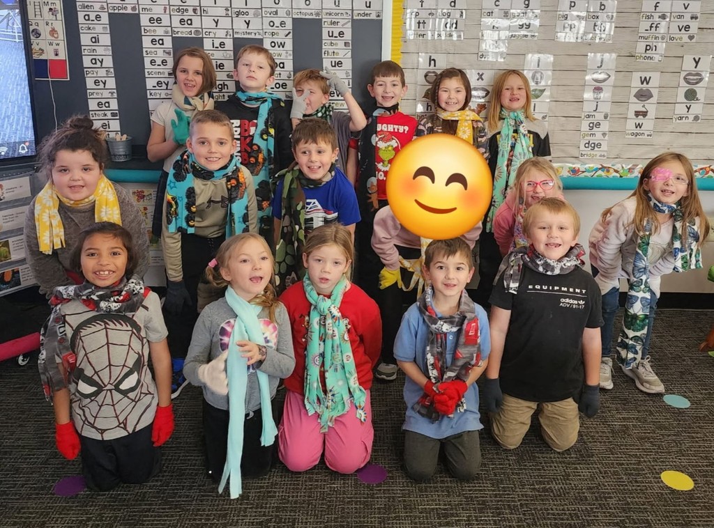 BPS first grade students show off their new scarves and gloves kindly provided by the Montpelier Church of the Nazarene