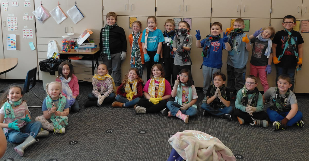 BPS first grade students show off their new scarves and gloves kindly provided by the Montpelier Church of the Nazarene