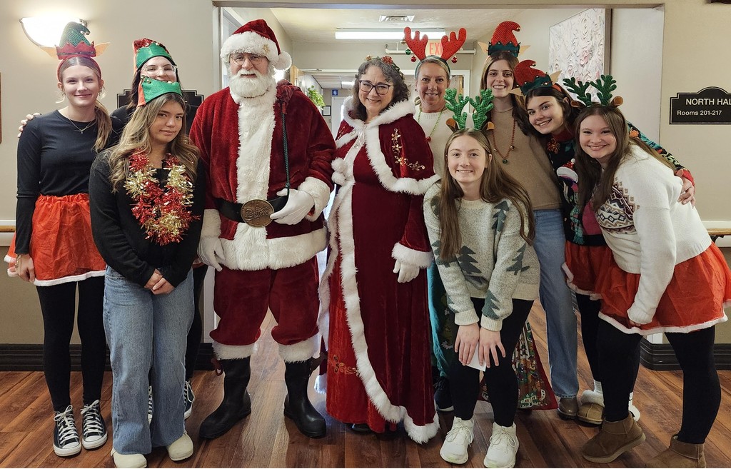 HOSA students join Santa and Mrs. Claus for the Christmas Parade at The Waters of Hartford City