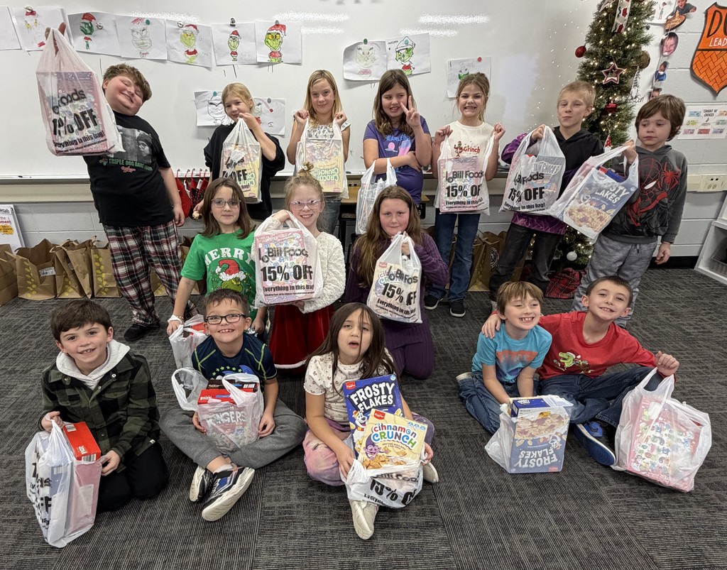 BCS students help distribute donated boxes of cereal to all BCS students