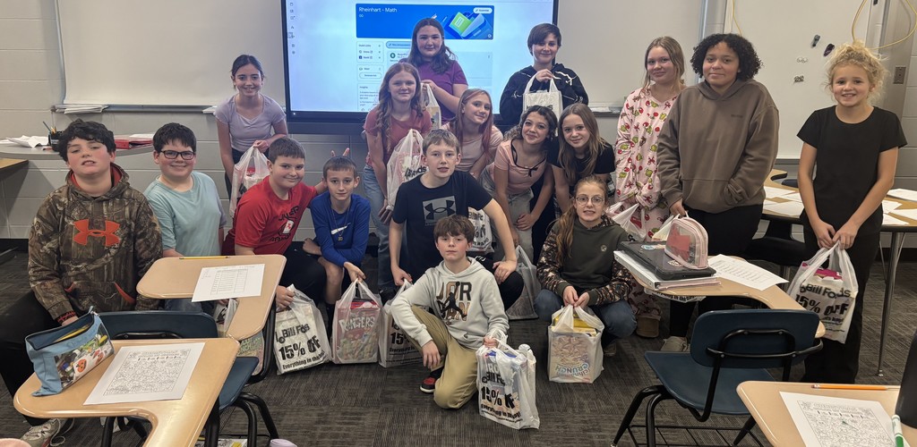 BCS students help distribute donated boxes of cereal to all BCS students