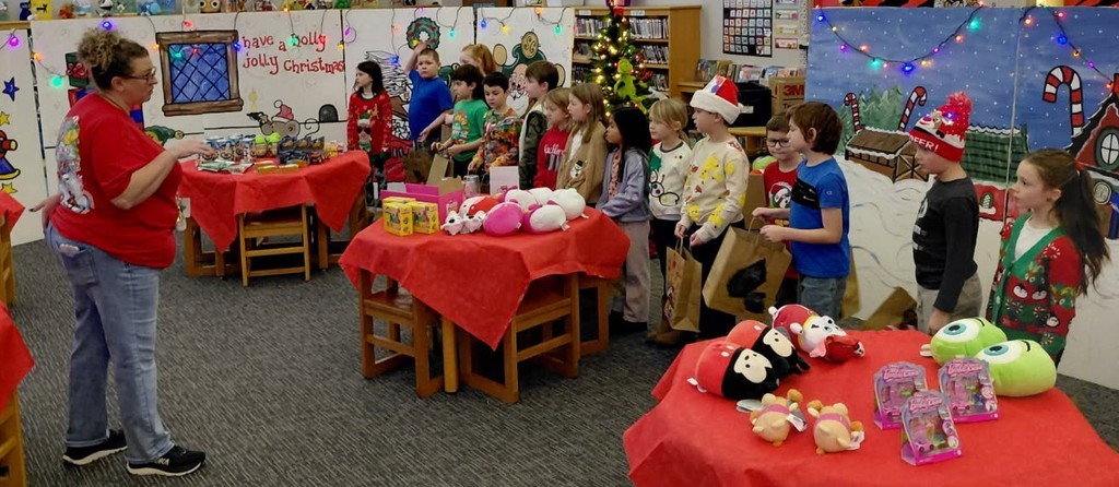 Students select their own presents to give to classmates during the Santa Shop at BPS