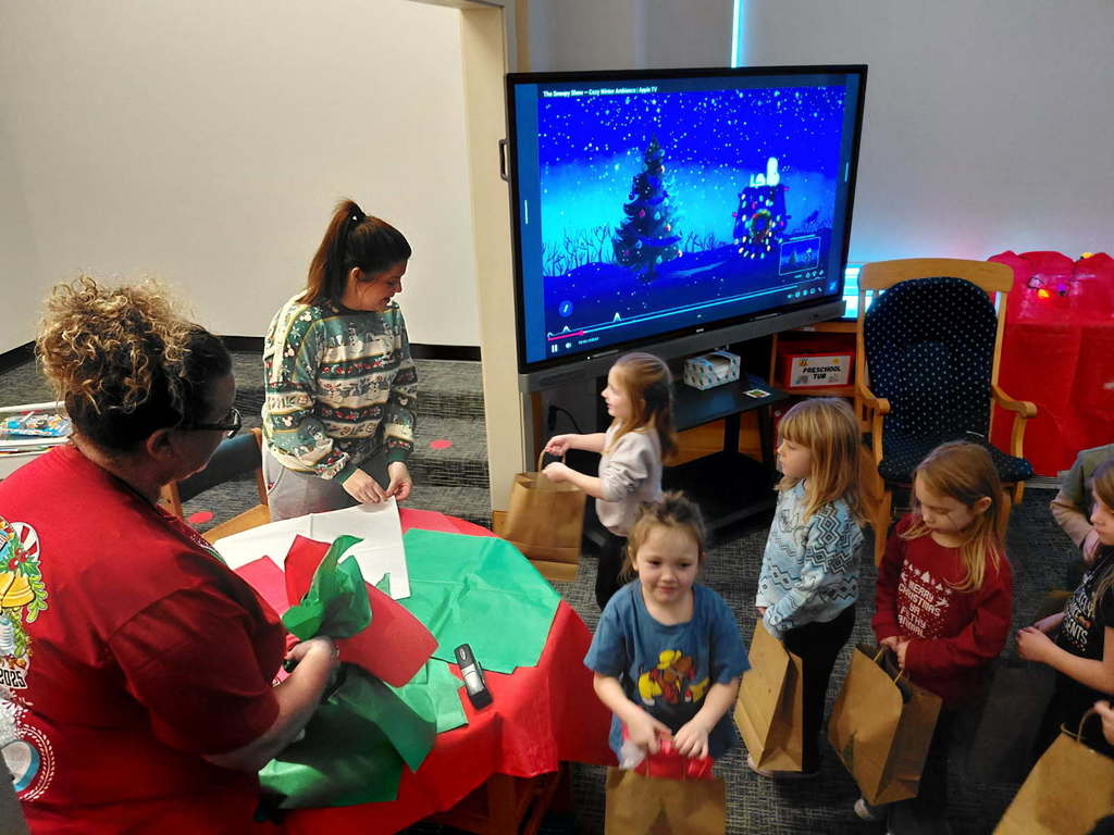 Students select their own presents to give to classmates during the Santa Shop at BPS