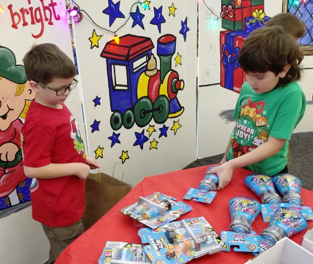 Students select their own presents to give to classmates during the Santa Shop at BPS