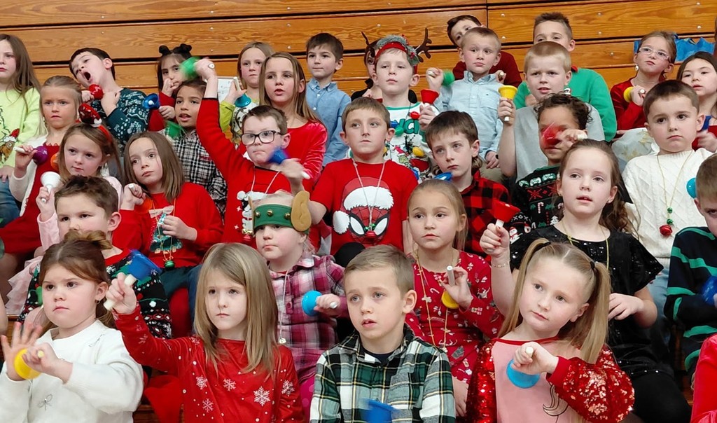 BPS students play the bells during the BPS Christmas program