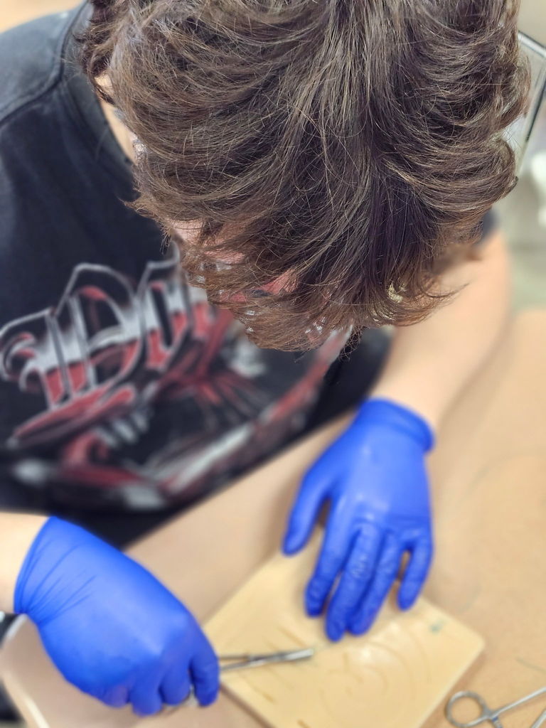 Students in the Principles of Healthcare class learn about doing dental impressions, sutures, and how to use a smart scale, as well as working on a project to help the animals at the Blackford County Animal Shelter.