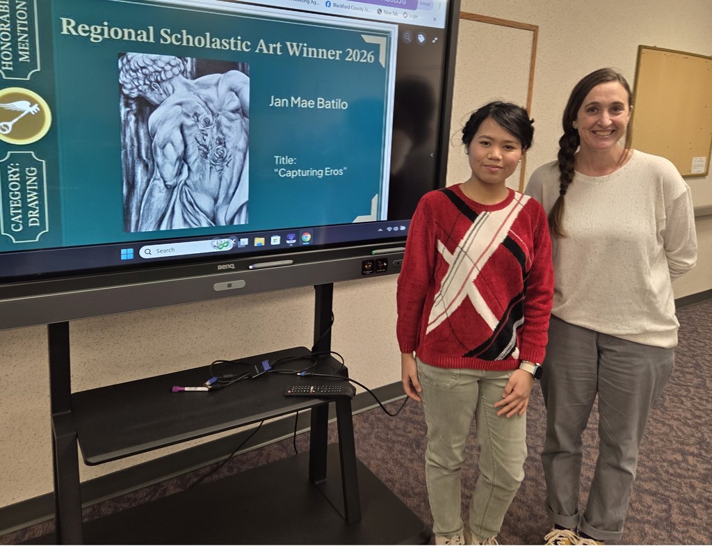 BJSHS student Jan Mae Batilo and Art Teacher Sydney Walter visited the School Board meeting to celebrate Jan Mae's award-winning artwork!