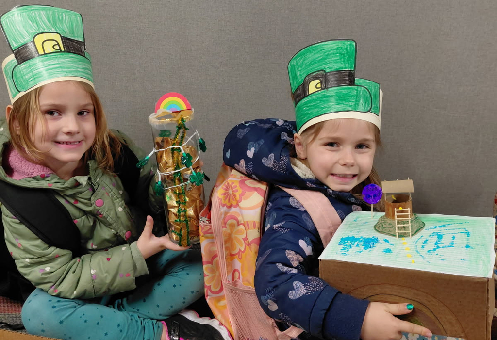 BPS Kindergarten students share the leprechaun traps they made.