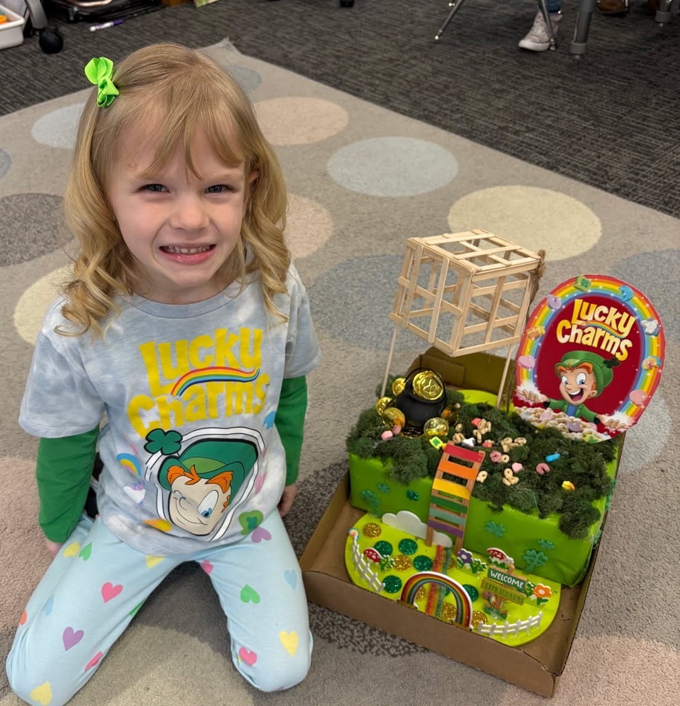 BPS Kindergarten students share the leprechaun traps they made.