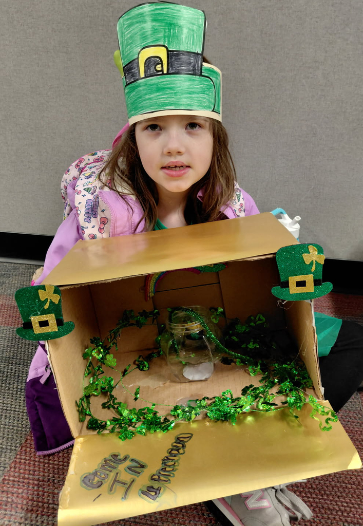 BPS Kindergarten students share the leprechaun traps they made.