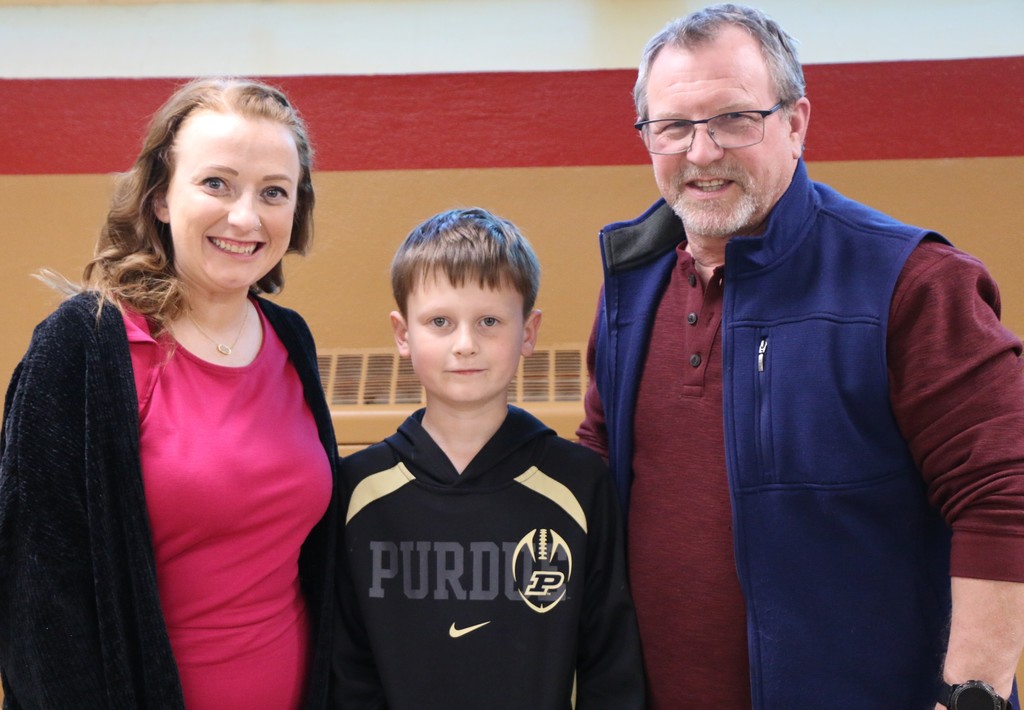 2026 Most Improved BPS Student Lucas Deane, joined by his teacher Victora Mattucci and principal Craig Campbell
