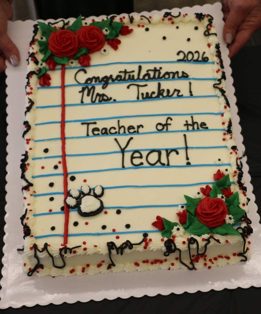 A cake to celebrate Julie Tucker was created to look like Julie's personal stationery