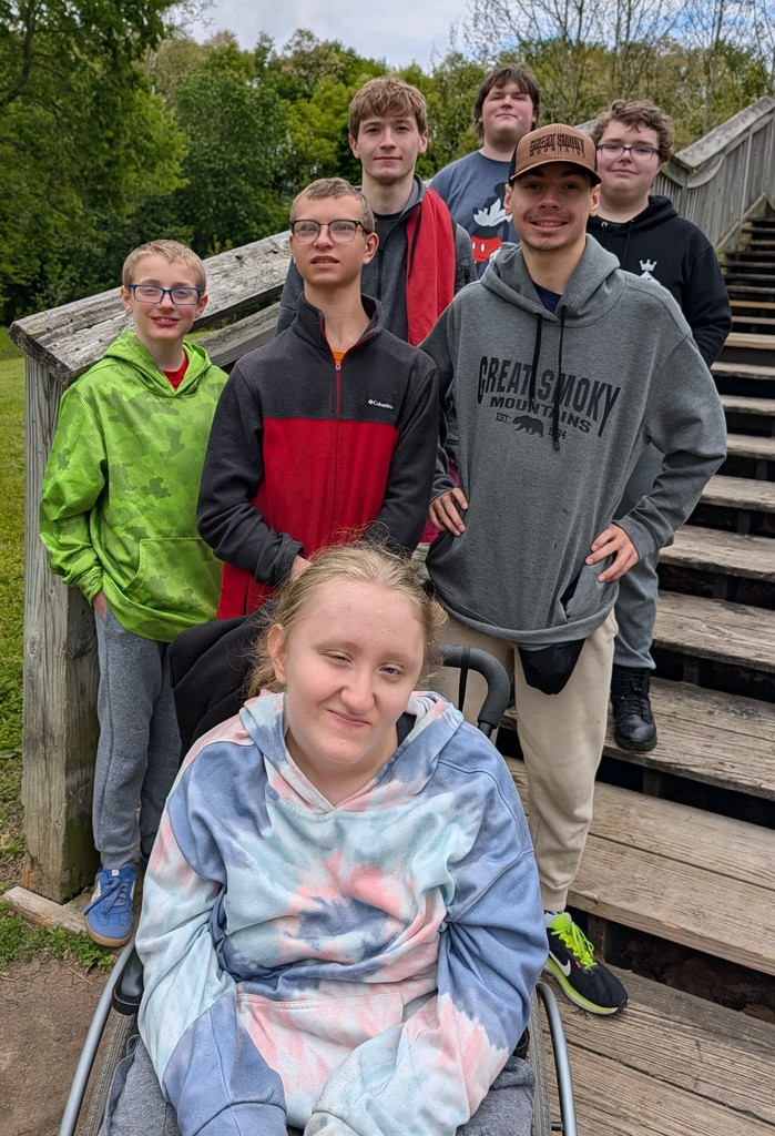 Members of Linda Wallace's special needs class of 6 boys and 1 girl pose for a photo on the stairs of the Gas City Park