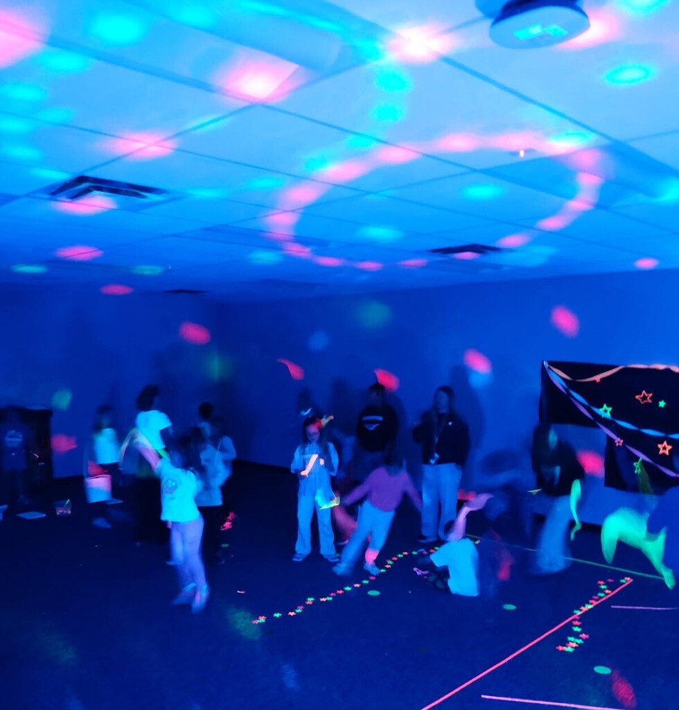 BPS 2nd graders play in the Glow Room during the PTO-sponsored Fun Day