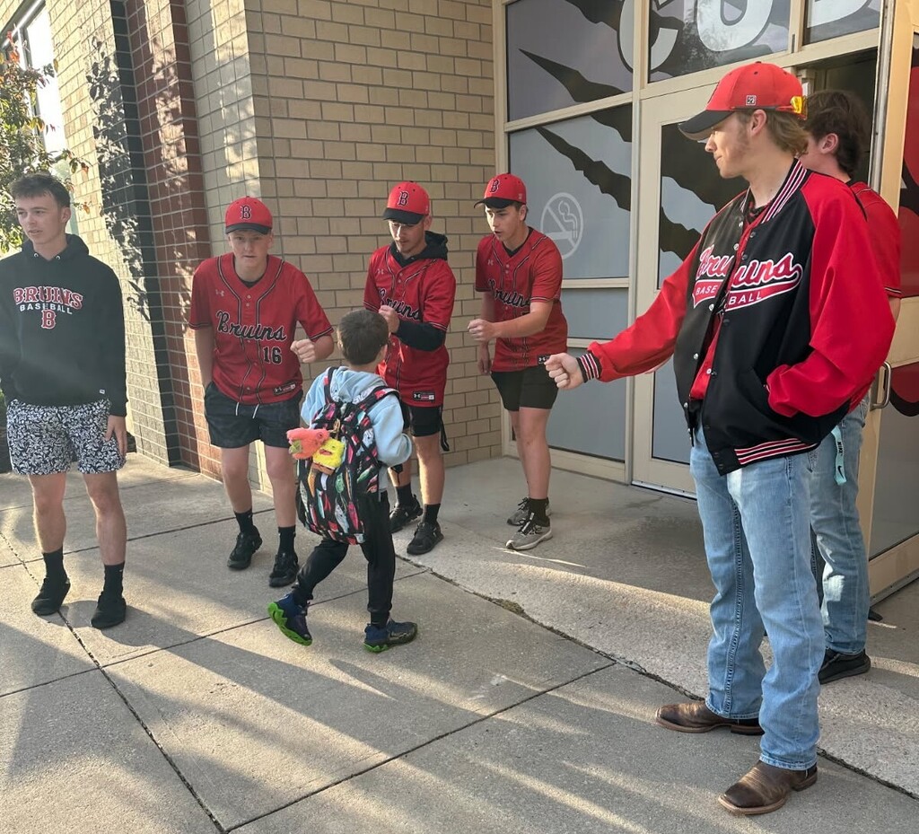 Members of the BJSHS Baseball Team greet the BPS Cubs on their way into school