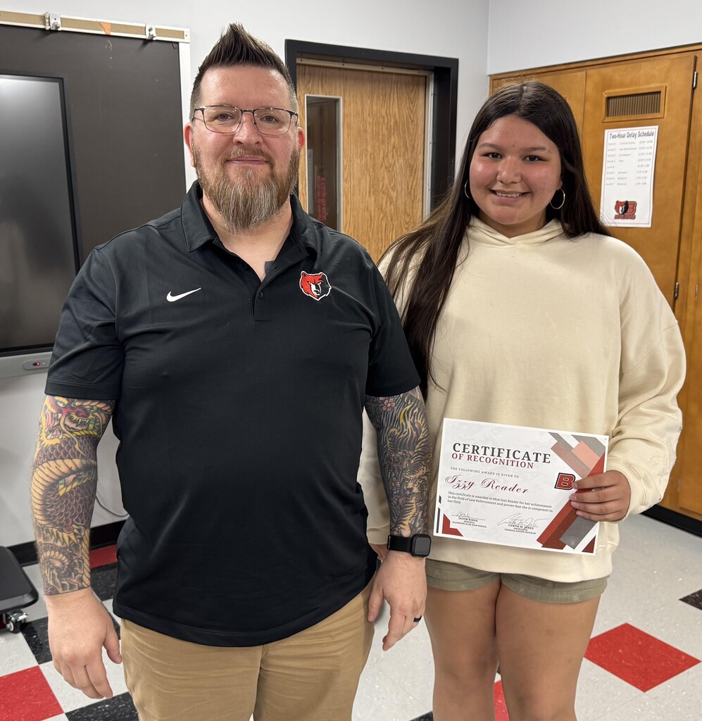 BJSHS student Izzy Reader received an award for Law Enforcement in her BJSHS Criminal Justice class from Instructor Mike Jones