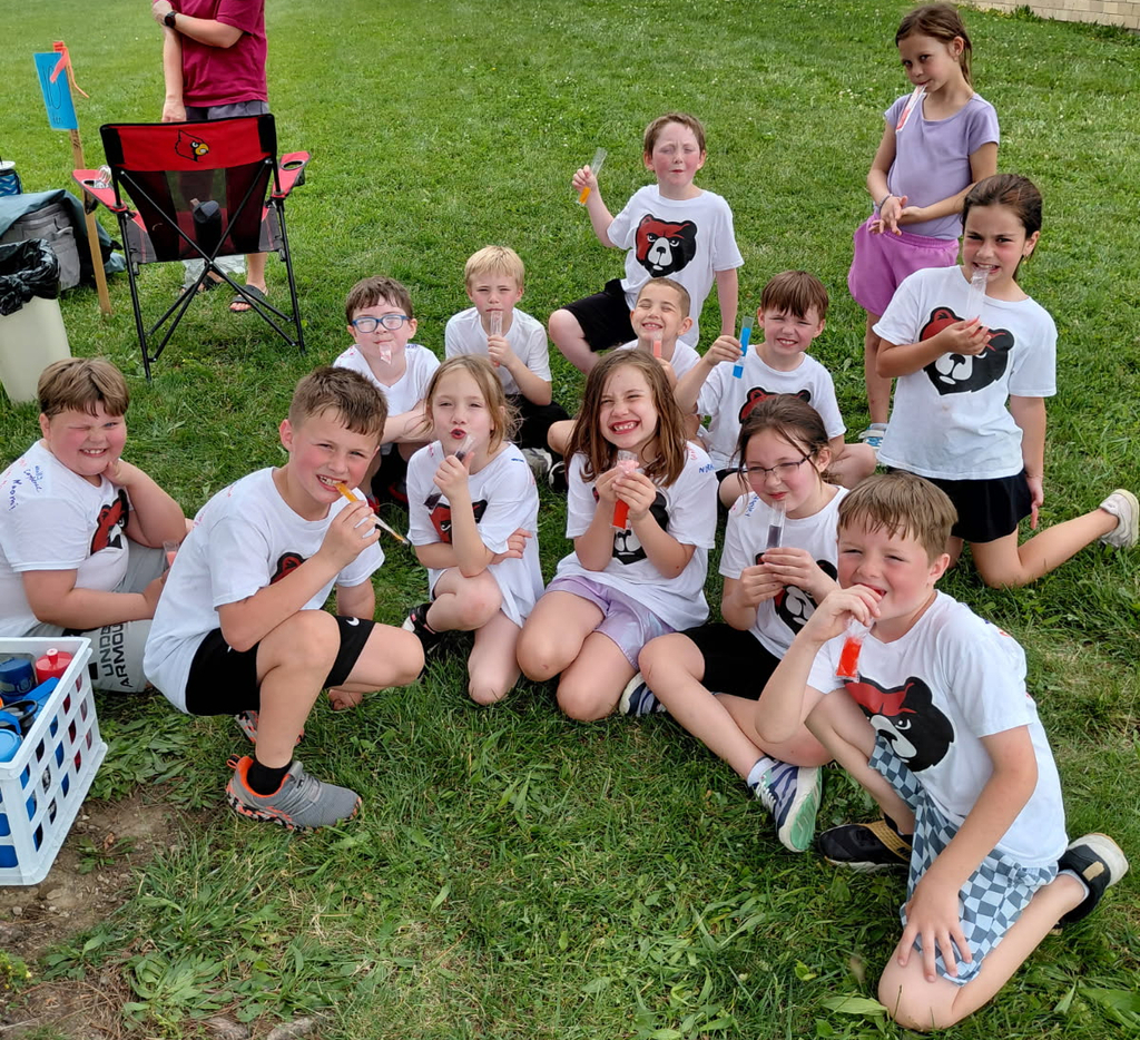 BPS students sit outside and enjoy a popsicle during the BPS End of School Field Day
