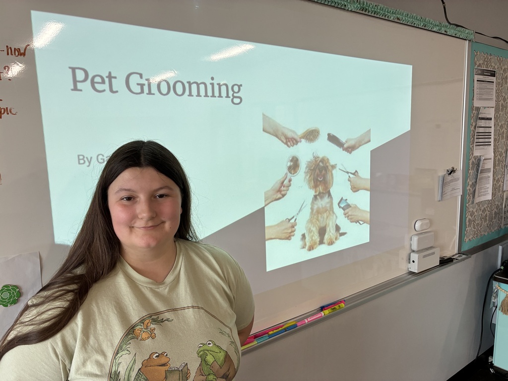 Snowflake's owner, Gabby Martin, brought her to school as part of her presentation on pet care