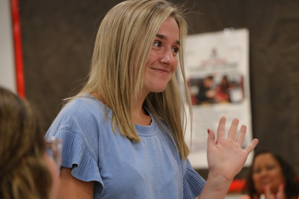 New science teacher Chloe Wicker waves hello during the BCS Back to School Breakfast