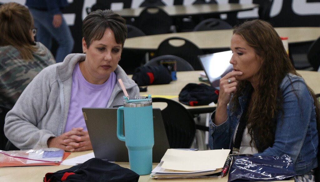 New teachers Kelly Bricker and Cat Myers attend the BCS Back to School Breakfast