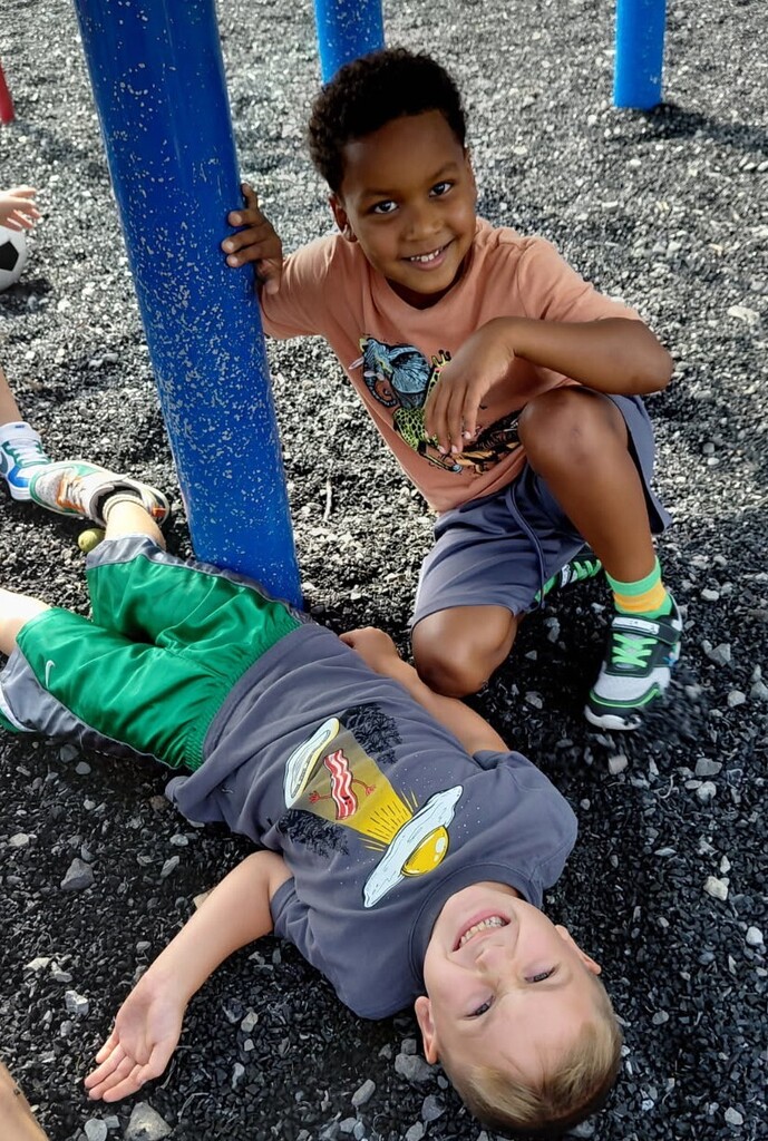 BPS boys pose for a photo at recess
