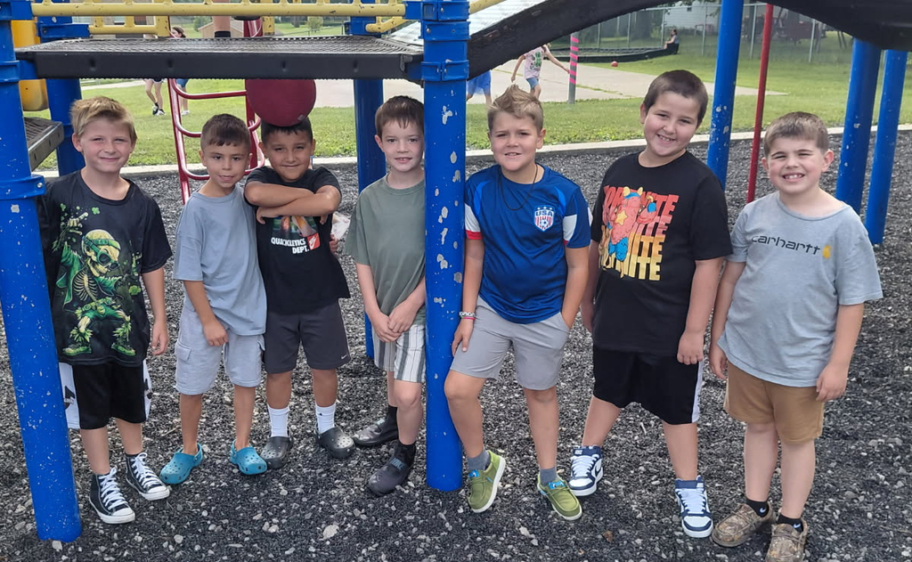 BPS boys pose for a photo at recess
