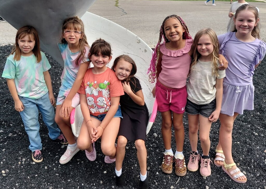 BPS girls pose for a photo at recess