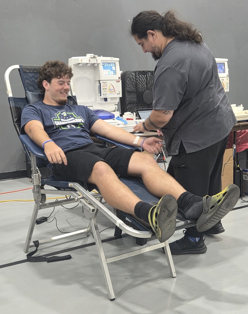 Brady Bannister donates blood at BJSHS