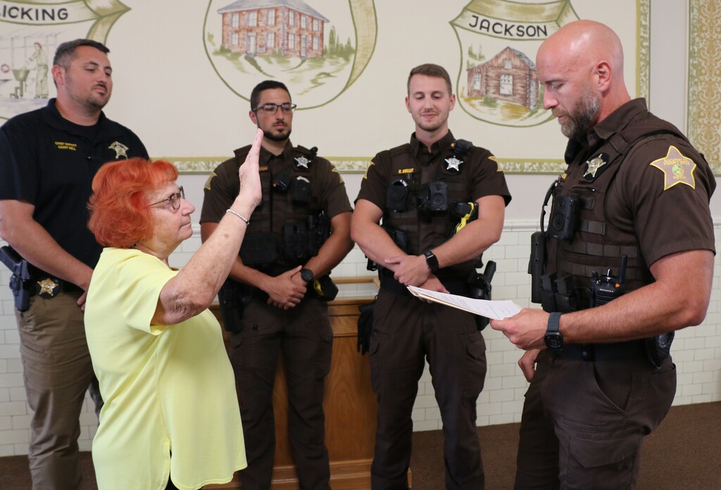 Doris Wilson was deputized at the courthouse on Friday afternoon by Blackford County Sheriff Jim Heflin. Also pictured (from left) Chief Deputy Casey Bell, School Resource Officer Devin Cavanaugh, and Deputy Connor Gulley