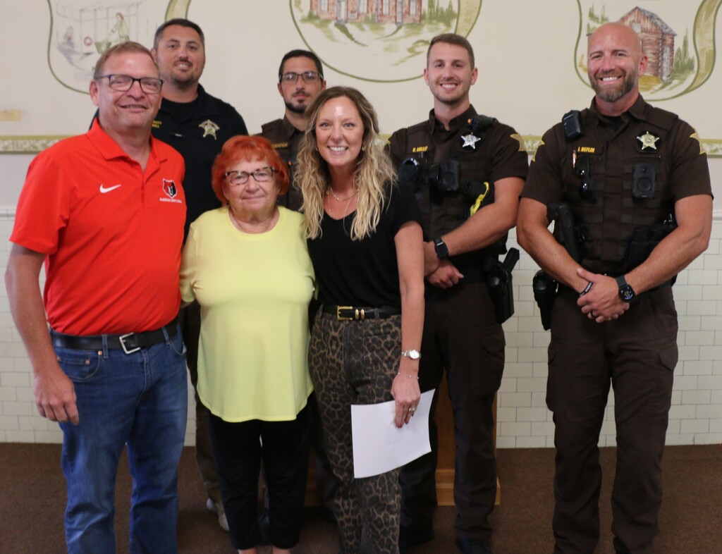 Swearing in ceremony for Doris Wilson (from left) Chad Yencer, Kim Pitts, back row Casey Bell, Devin Cavanaugh, and Jim Heflin