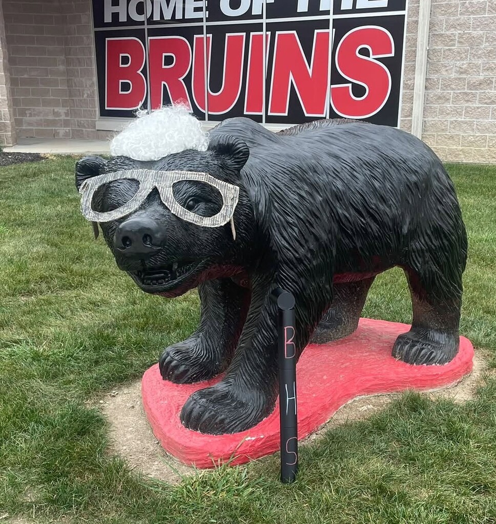 Blackford Bruin with gray hair and glasses