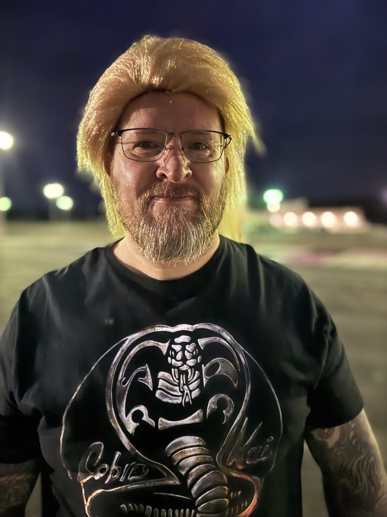 BJSHS Criminal Justice Instructor Mike Jones participates in Decades Day during Homecoming Week
