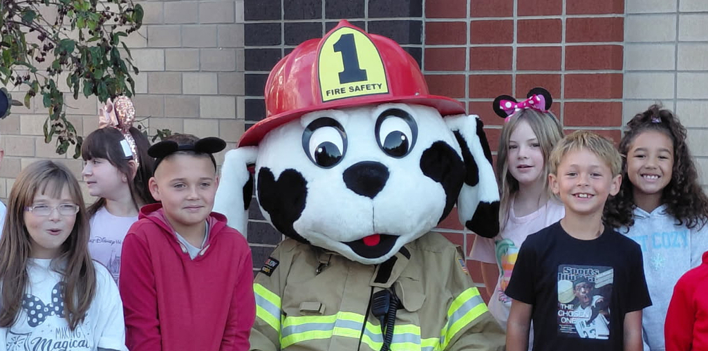 Boys and girls from BPS pose with the Hartford City Fire Department mascot