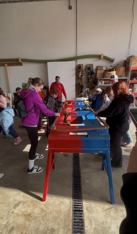 Students learn about water and tools to repair pipes during their visit to the Hartford City Water Treatment Plant