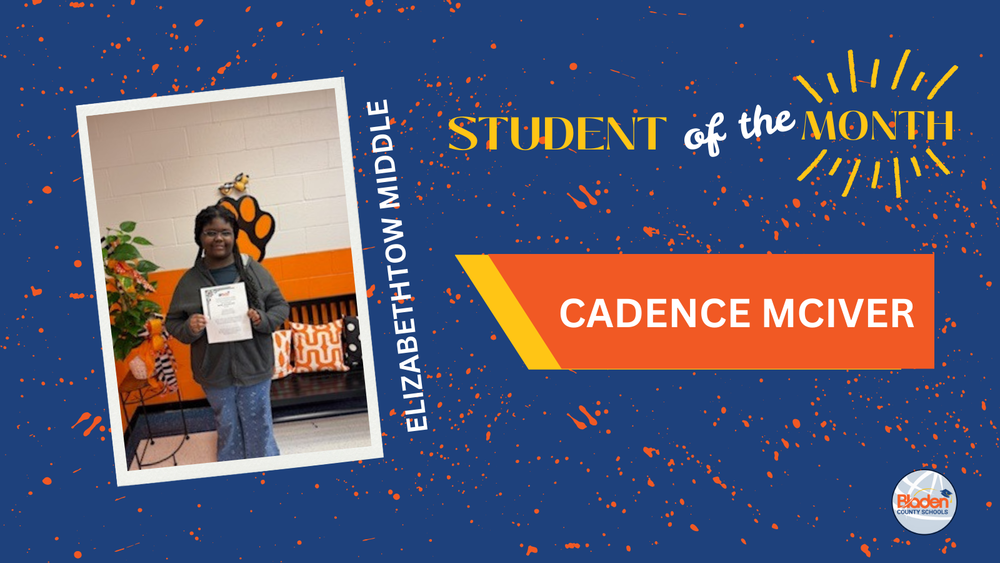 Cadence McIver, Elizabethtown Middle Student of the Month, holds a certificate while standing indoors at school.