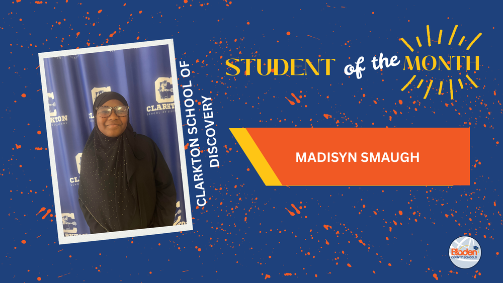 Student of the Month graphic featuring Madisyn Smaugh from Clarkton School of Discovery, smiling while standing in front of a school-branded backdrop, wearing glasses and a black headscarf, with bold blue and orange design elements and Bladen County Schools logo.