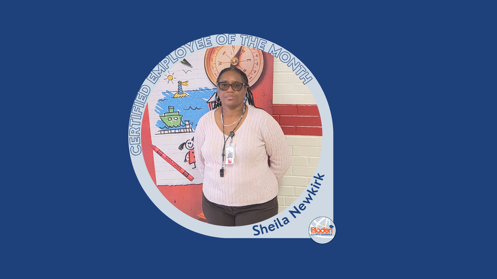 Graphic announcing Certified Employee of the Month featuring Sheila Newkirk, standing in front of a colorful classroom mural, wearing glasses and a light sweater, with Bladen County Schools logo.