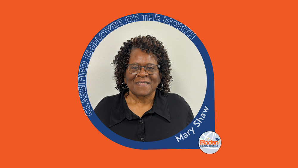 Graphic announcing Classified Employee of the Month featuring Mary Shaw, smiling in a professional portrait against a light background, wearing glasses and a black blouse, with Bladen County Schools logo.