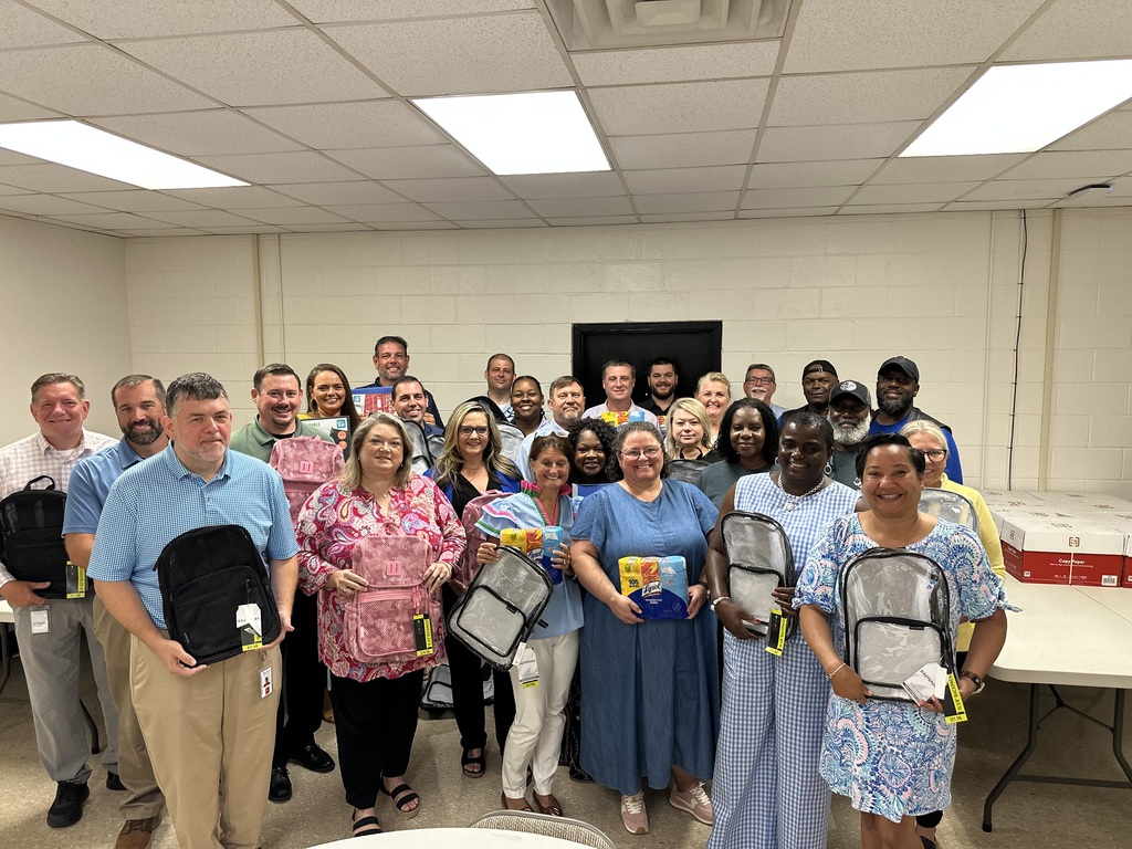 Bladen County Schools principals and assistant principals with the team from Big Swins and school supplies
