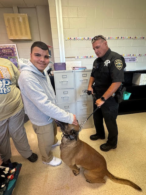 🐾 Special Visit from the K-9 Unit 🐾 Last week, our students in Mrs. Jones’ class had an exciting opportunity to meet a K-9 officer and his dog, Orex! 🐕🚔 The students learned about the important role K-9 officers like Orex play in keeping our community safe and even got to see him in action. It was an engaging and memorable experience for everyone! 🏰💜 #WestBladenKnights #CommunityPartners #K9Unit #Orex #GoKnights
