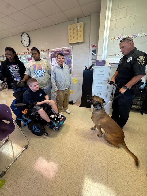 🐾 Special Visit from the K-9 Unit 🐾 Last week, our students in Mrs. Jones’ class had an exciting opportunity to meet a K-9 officer and his dog, Orex! 🐕🚔 The students learned about the important role K-9 officers like Orex play in keeping our community safe and even got to see him in action. It was an engaging and memorable experience for everyone! 🏰💜 #WestBladenKnights #CommunityPartners #K9Unit #Orex #GoKnights