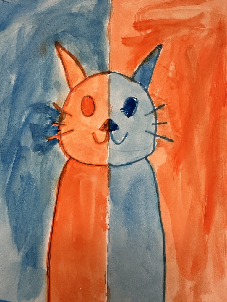 A split-color drawing of a cat, with the left side painted orange and the right side painted blue. The background mirrors the same two colors.