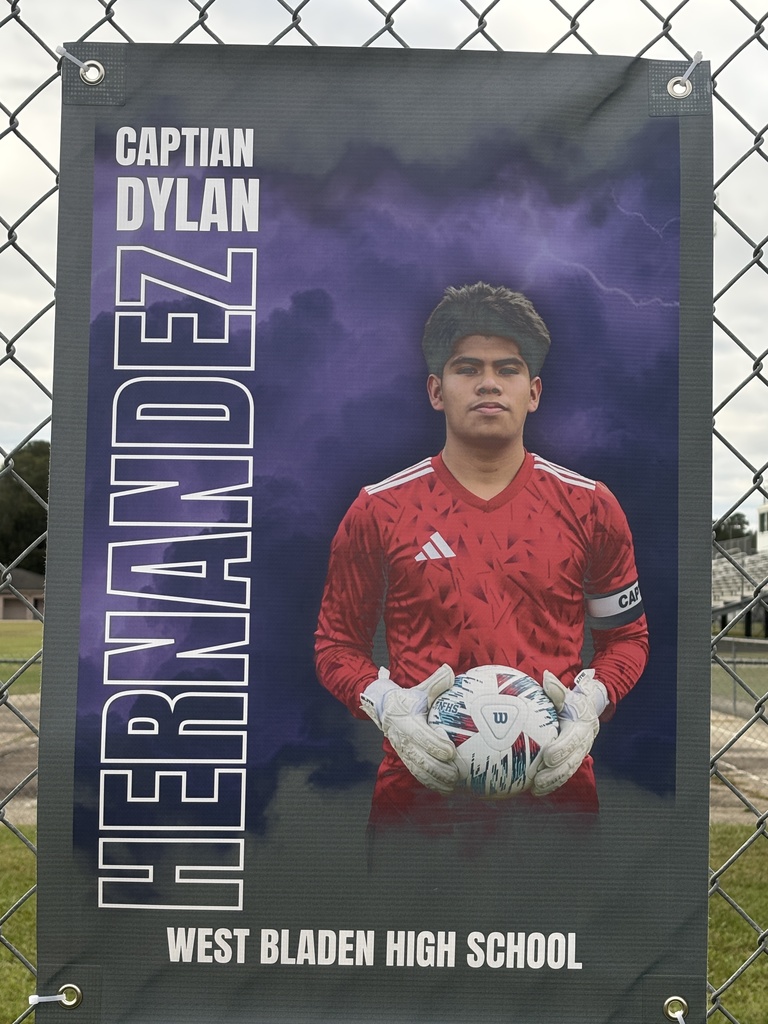 A soccer banner featuring a West Bladen player wearing a blue Knights jersey with the number 15. The banner includes the player’s name, “Gerson Verdugo Roblero,” displayed in bold white and purple letters on a stormy purple background with lightning accents. The player is giving two thumbs up and looking toward the camera.