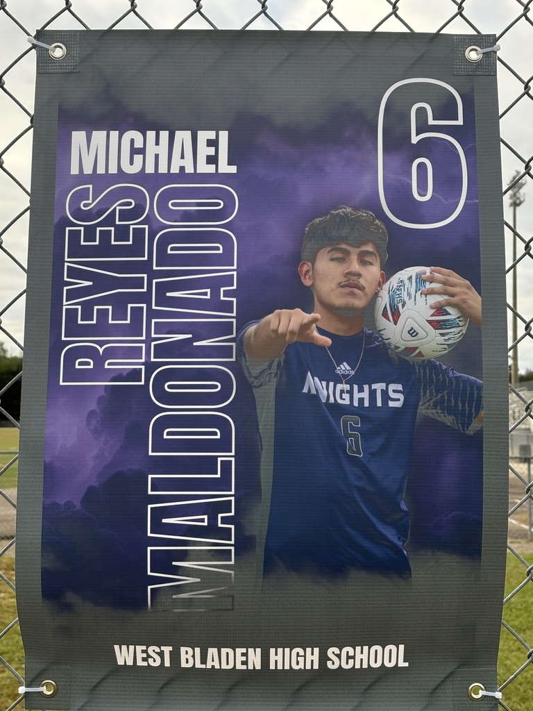 A soccer banner featuring a West Bladen player wearing a blue Knights jersey with the number 15. The banner includes the player’s name, “Gerson Verdugo Roblero,” displayed in bold white and purple letters on a stormy purple background with lightning accents. The player is giving two thumbs up and looking toward the camera.