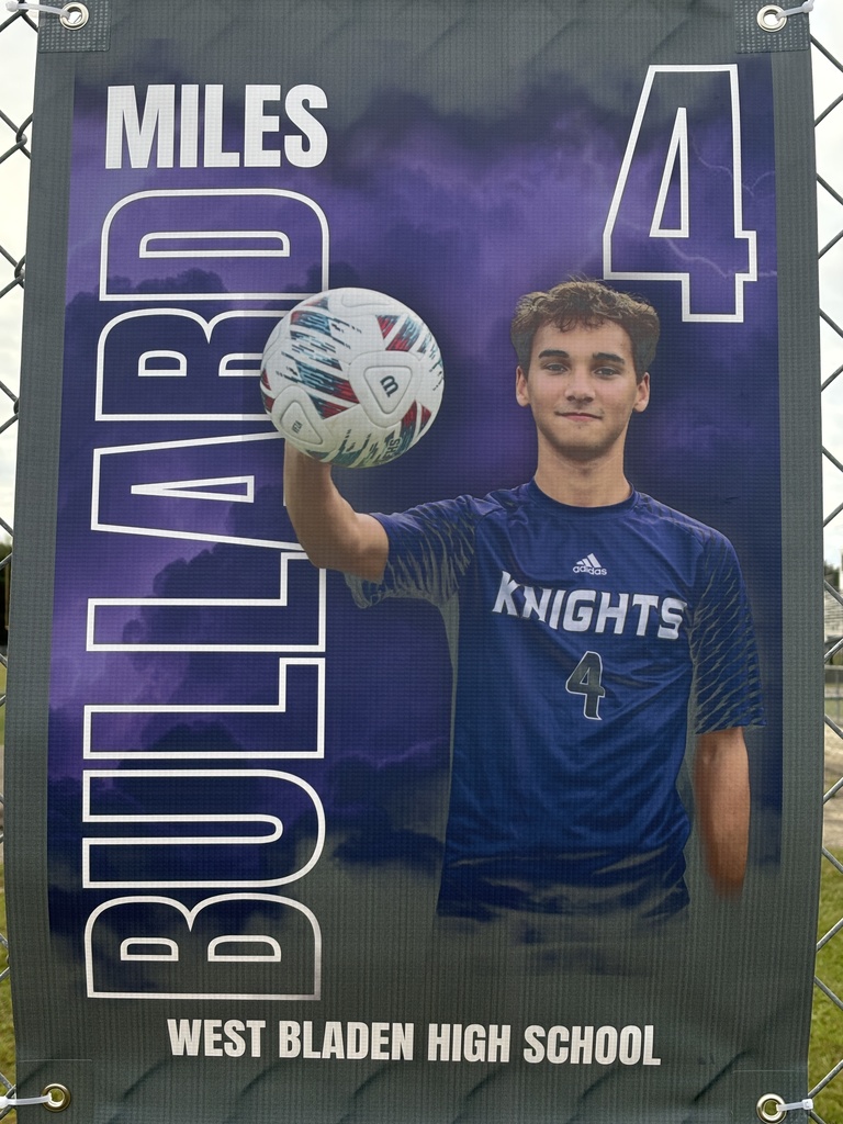 A soccer banner featuring a West Bladen player wearing a blue Knights jersey with the number 15. The banner includes the player’s name, “Gerson Verdugo Roblero,” displayed in bold white and purple letters on a stormy purple background with lightning accents. The player is giving two thumbs up and looking toward the camera.
