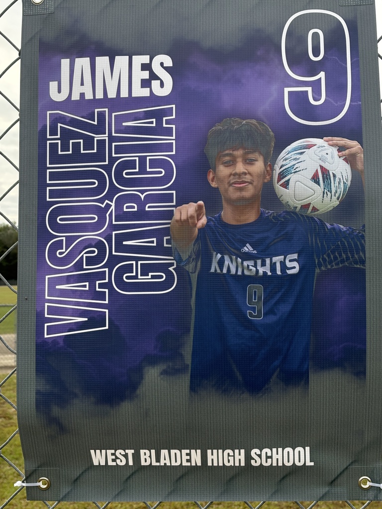 A soccer banner featuring a West Bladen player wearing a blue Knights jersey with the number 15. The banner includes the player’s name, “Gerson Verdugo Roblero,” displayed in bold white and purple letters on a stormy purple background with lightning accents. The player is giving two thumbs up and looking toward the camera.