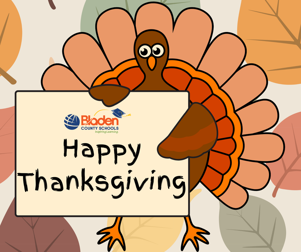 A cartoon turkey holding a sign that reads ‘Happy Thanksgiving’ with the Bladen County Schools logo above the text. Colorful fall leaves create the background.