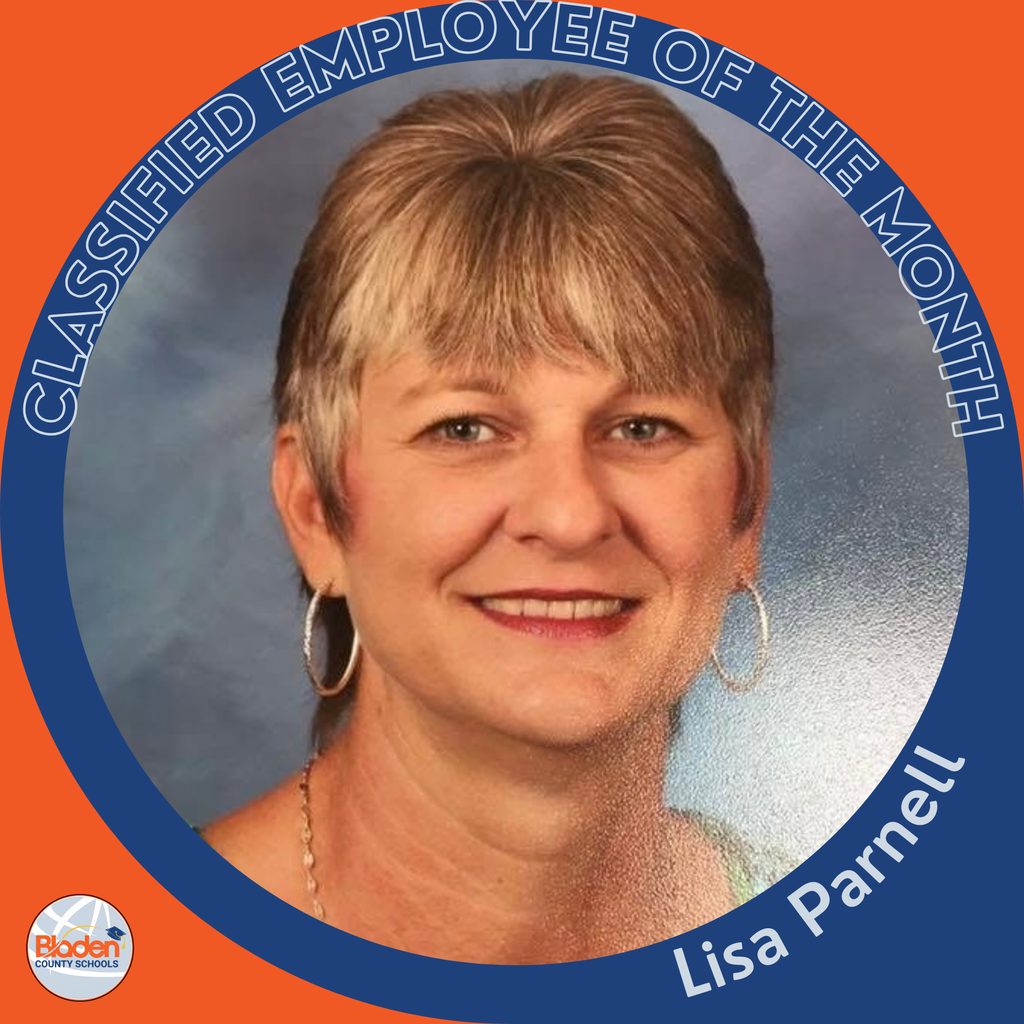A woman with short gray-blonde hair and hoop earrings smiles in front of a blue portrait-style background. The circular frame reads ‘Classified Employee of the Month – Lisa Parnell,’ with the Bladen County Schools logo in the corner.