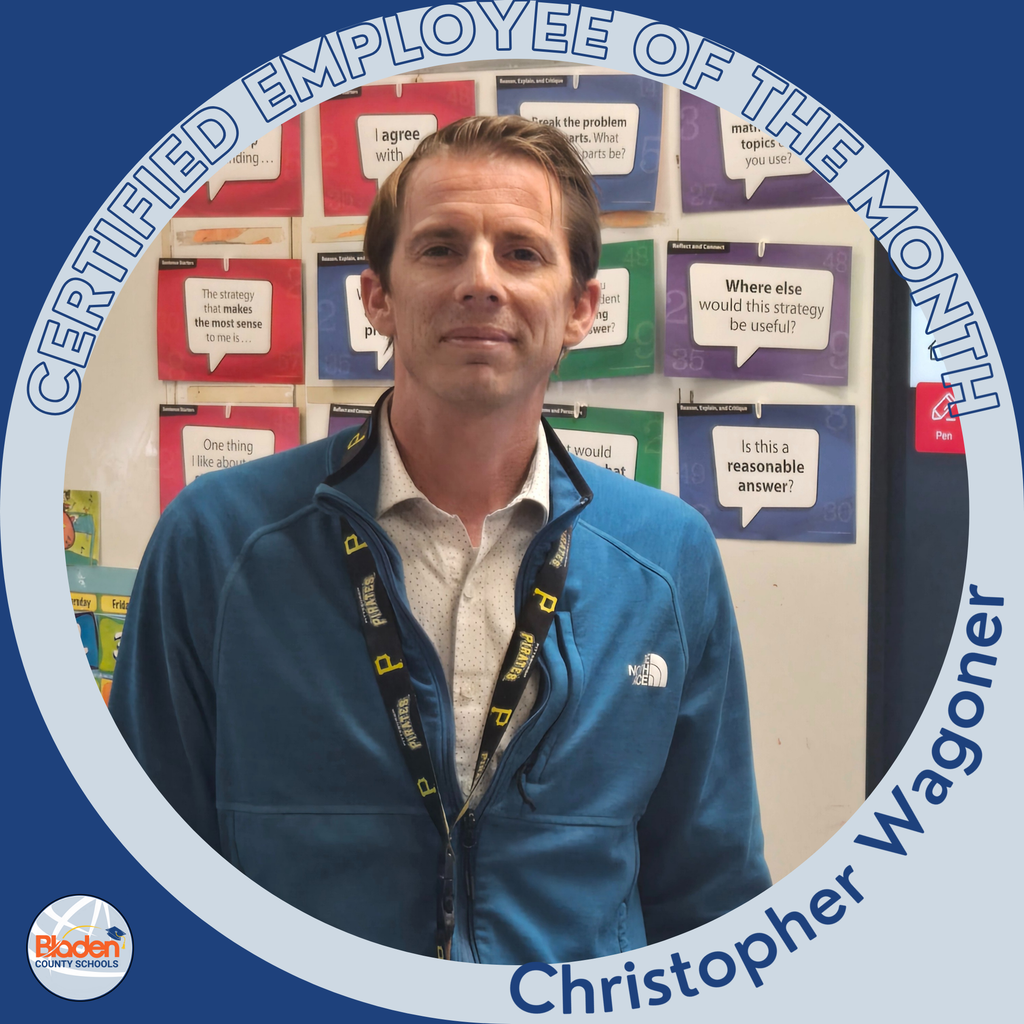 Circular graphic showing a man standing in a classroom with colorful educational posters behind him. He is wearing a blue jacket and a lanyard. The border reads “Certified Employee of the Month,” and the name “Christopher Wagoner” appears at the bottom. A Bladen County Schools logo is in the lower-left corner.