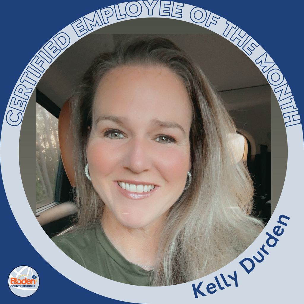Circular ‘Certified Employee of the Month’ graphic featuring a woman smiling while seated in a car. She has long light-brown hair and is wearing a green top. Text on the graphic reads ‘Kelly Durden.